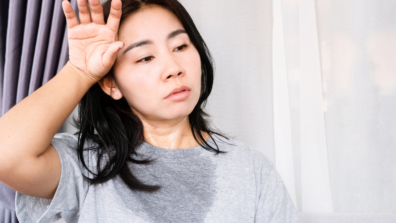What causes sweaty hands and feet?