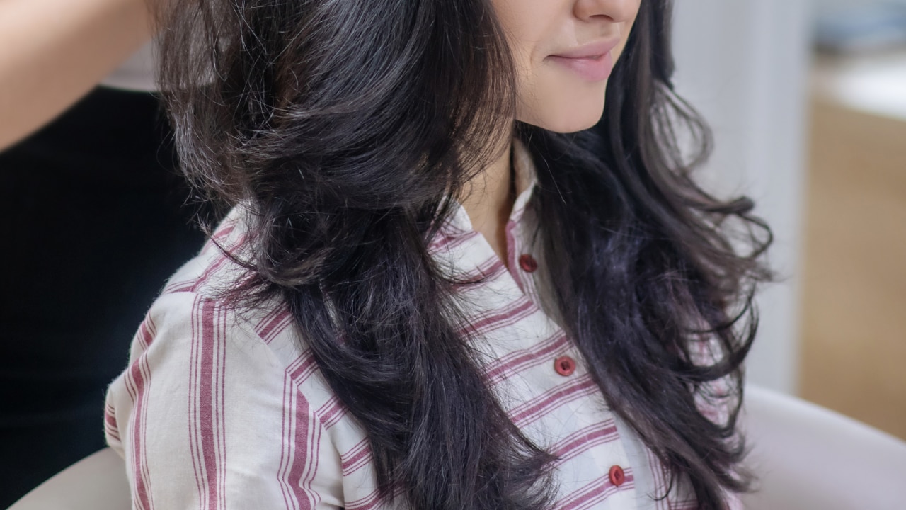 A face-framing long-layered cut