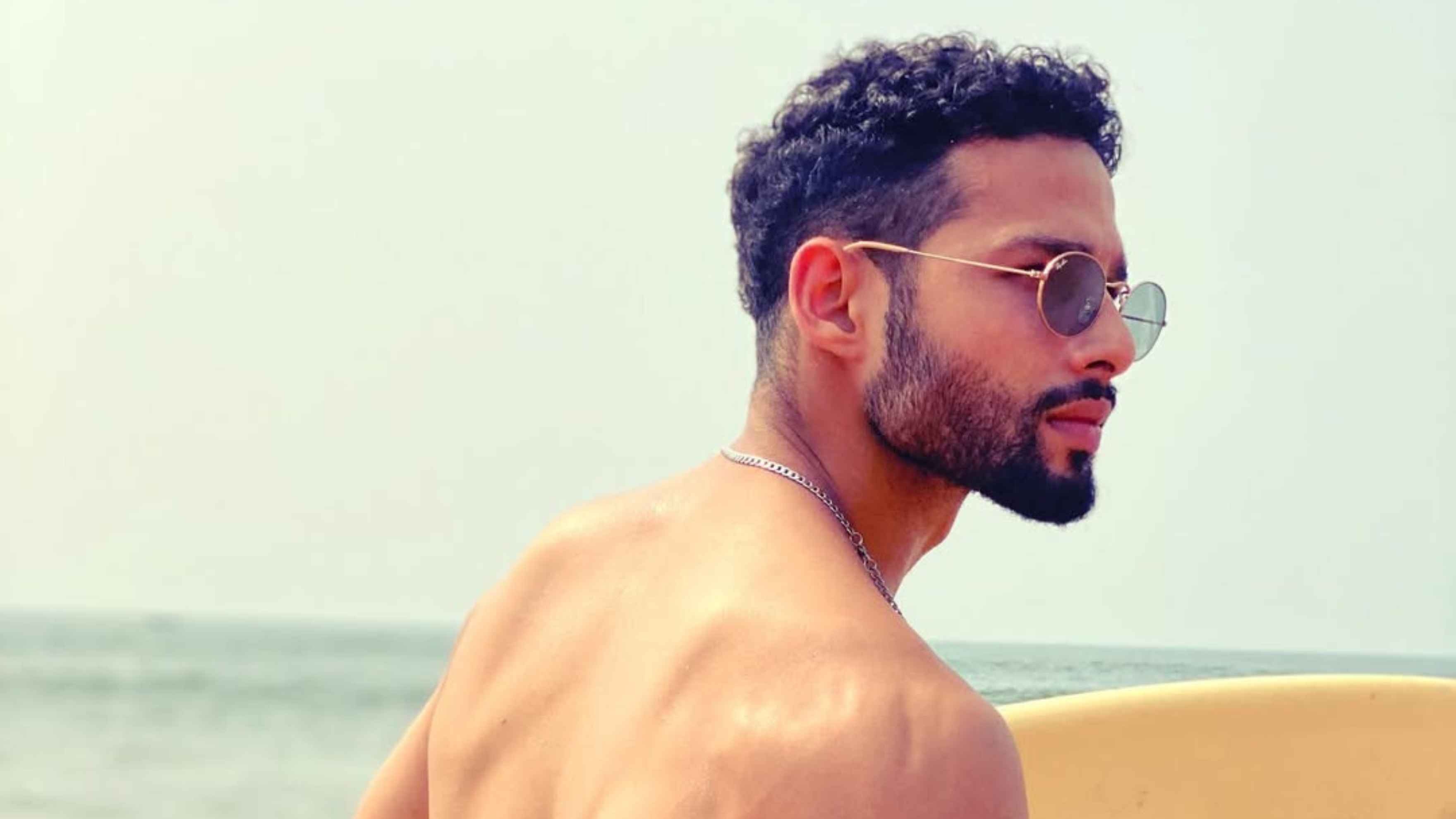 Low Skin Fade with Defined Curls