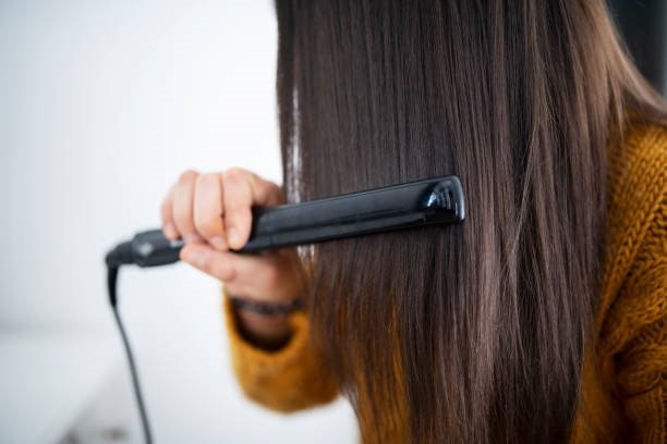 Best product to put on hair before flat ironing best sale