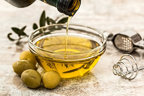 The Secret To Smooth, Silky Hair? Olive Oil