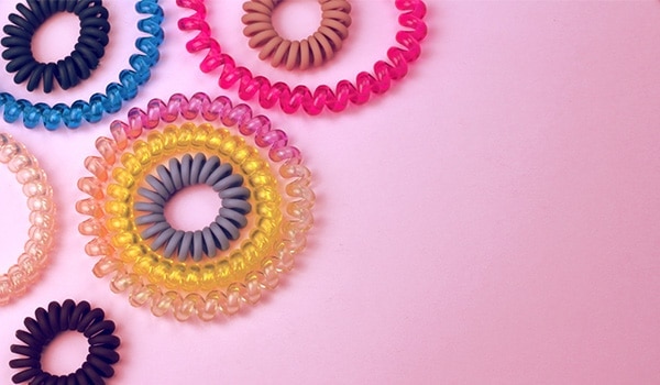 Switch to spiral hair ties and up your mane game